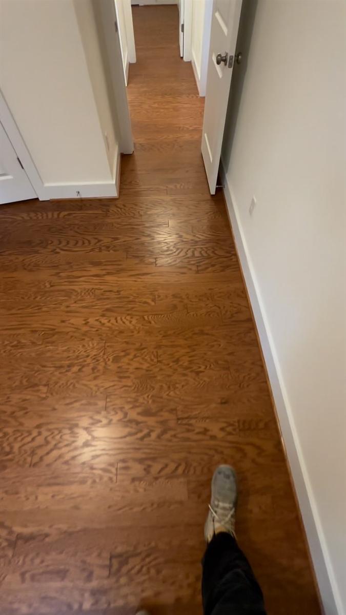 Engineered wood floor in a residential hallway