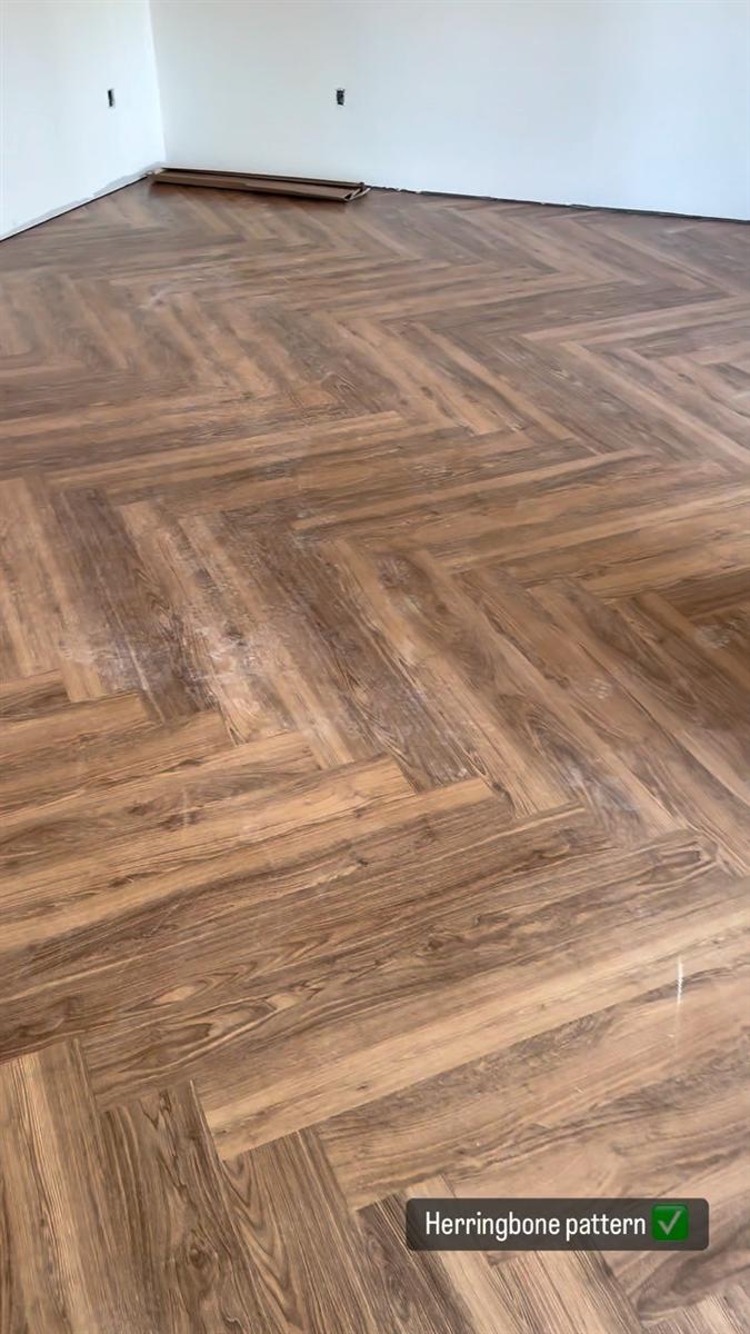 Herringbone pattern vinyl floor